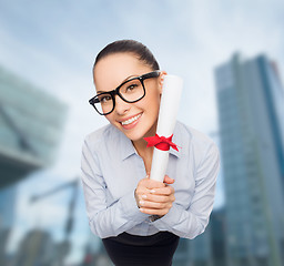 Image showing smiling businesswoman in eyeglasses with diploma