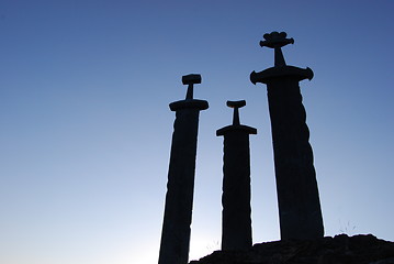 Image showing Swords in rock