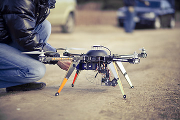 Image showing Quadrocopter drone ready to takeoff