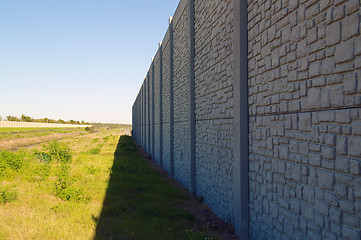 Image showing wall with vanishing point and field