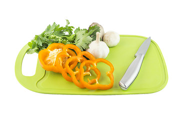 Image showing Parsley and mushroom on green Plastic board