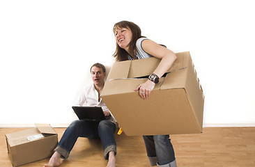 Image showing couple moving in appartment