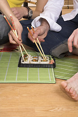 Image showing eating sushi