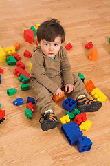 Image showing baby playing in empty room