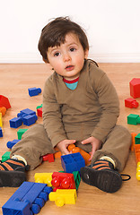Image showing baby playing in empty room
