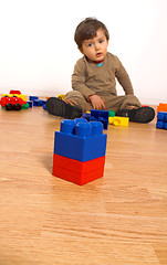 Image showing baby playing in empty room