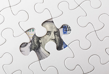 Image showing White puzzle with American dollar