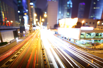 Image showing Busy traffic light on roadway