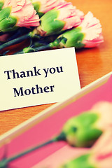 Image showing Carnation flower and thank you card