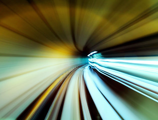 Image showing Train moving fast in tunnel