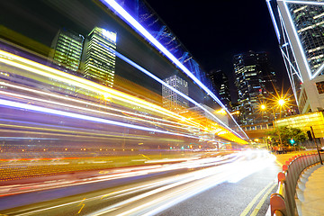 Image showing Fast moving car light in city