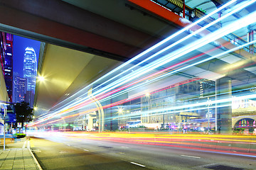 Image showing Traffic car light on roadway in city