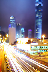 Image showing Fast moving car light on highway