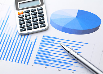 Image showing Graphical chart with pen and calcultor