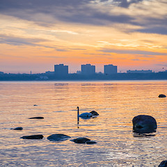 Image showing Beautiful sunrise on the sea. Views of Tallinn.