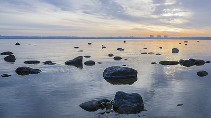 Image showing Beautiful sunrise on the sea. Views of Tallinn.