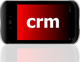 Image showing crm word on smart mobile phone, business concept