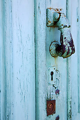 Image showing spain  hand brass knocker abstract door wood in the grey