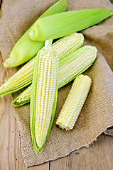 Image showing Corncob on burlap and board