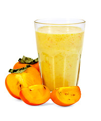 Image showing Milkshake with persimmon slices in a glass