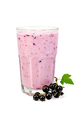 Image showing Milkshake with black currants in a glass