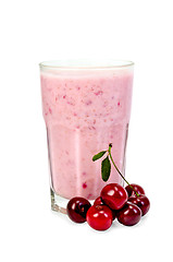 Image showing Milkshake with cherry in a glass