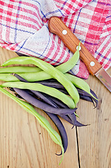 Image showing Beans green and purple on board