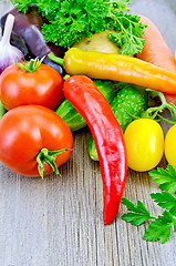 Image showing Vegetables with garlic on a board