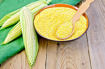 Image showing Corn grits with corncobs and napkin