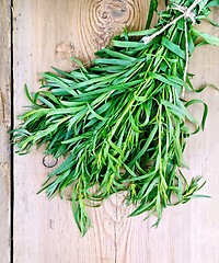 Image showing Tarragon on a wooden board