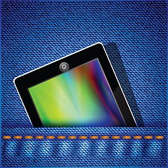 Image showing tablet computer on jeans background