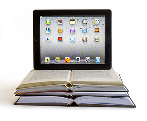 Image showing Ipad 3 on books