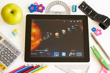 Image showing Planets on Ipad 3 with school accesories