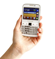 Image showing Hand holding Samsung Galaxy Y Pro B5510