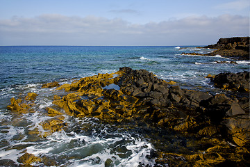 Image showing water  in lanzarote  isle foam rock   stone sky cloud beach  