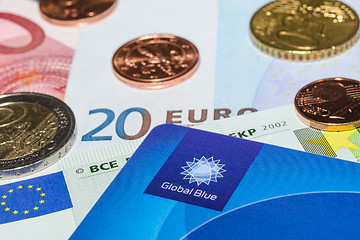 Image showing Tax Free plastic card from company Global Blue on banknotes