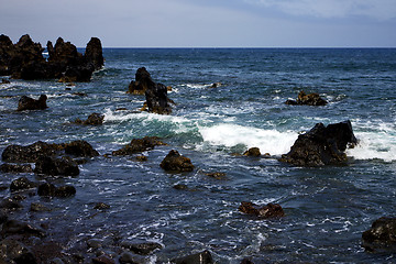 Image showing  rock spain  sky light  beach water  in lanzarote foam  landscap