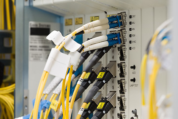 Image showing fiber optic datacenter with media converters and optical cables 