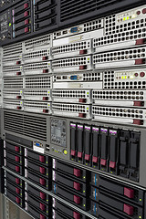 Image showing servers stack with hard drives in a datacenter