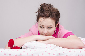 Image showing Girl disappointed from donated to her rings