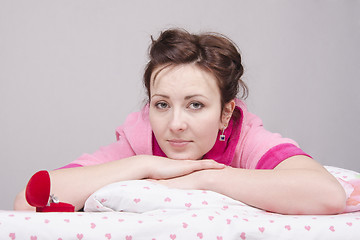 Image showing Girl in bed upset gift