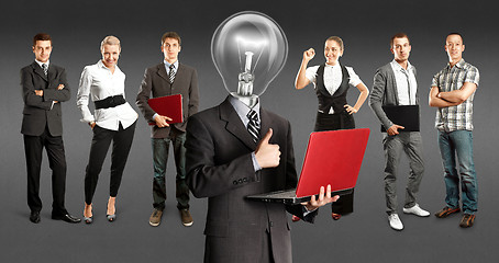 Image showing Business Team With Lamp Head