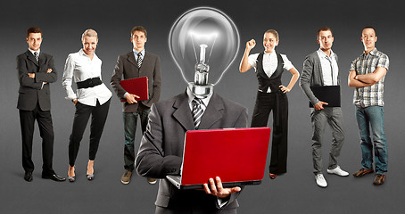 Image showing Business Team With Lamp Head