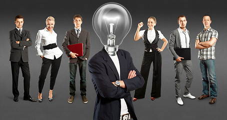 Image showing Business Team With Lamp Head