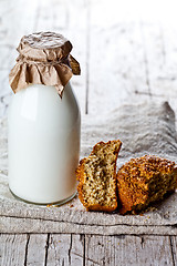 Image showing bottle of milk and fresh baked bread