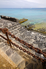 Image showing pier rusty chain  water  in lanzarote 