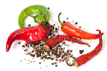 Image showing Mix of hot peppers on white background