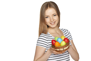 Image showing Female holding basket with Easter eggs