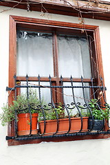 Image showing Old window on a white wall.
