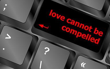 Image showing love cannot be compelled words showing romance and love on keyboard keys